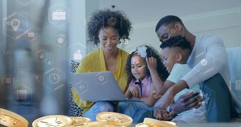 Family watching laptop together with digital finance icons and gold coin overlay