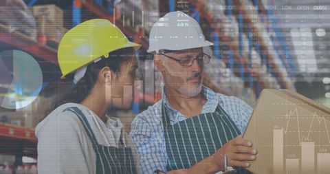 Warehouse workers analyzing data for global shipping logistics