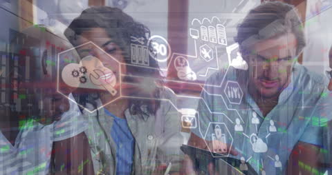 Diverse Business Team Engaging with Digital Technology and Data Icons