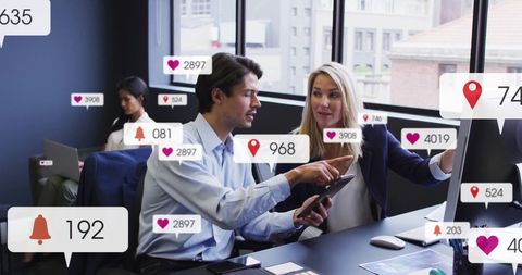 Team engaged with social media analytics in modern office
