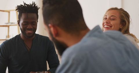 Diverse Friends Enjoying Leisure Time at Home in Relaxed Setting