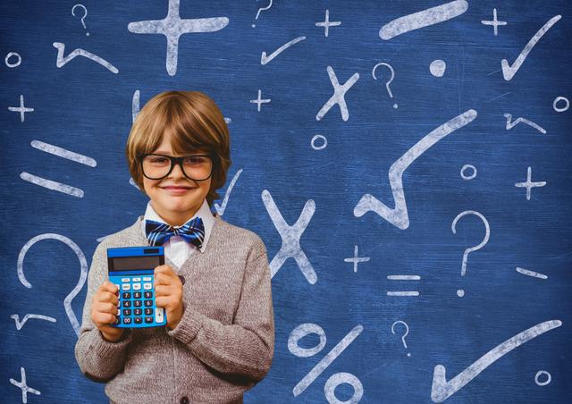 Young boy wearing glasses and a bow tie holding a calculator, standing in front of a chalkboard filled with mathematical symbols. Ideal for educational content, back-to-school promotions, math tutoring services, and academic materials.