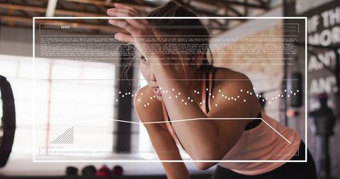 Interactive Digital Data Overlay on Woman during Gym Workout