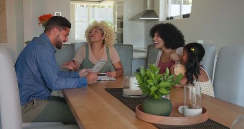 Family Bonding at Breakfast Table with Laughter and Joy