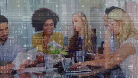 Diverse Business Team Collaborating Over Tech with Digital Overlay