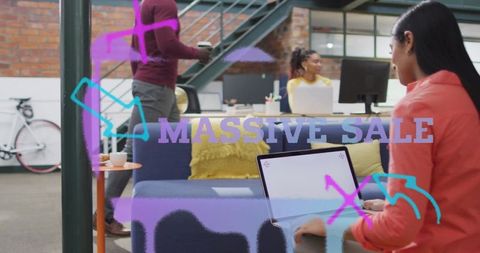 Typing Woman in Office Lounge with Massive Sale Text Overlay