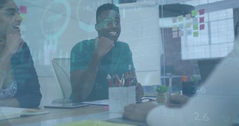 Business Team Collaborating with Financial Data Led Overlay