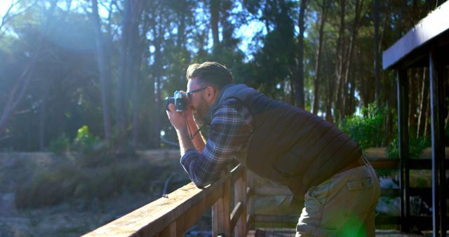Man Photographing Scenic Outdoors in Nature Reserve - Download Free Stock Images Pikwizard.com