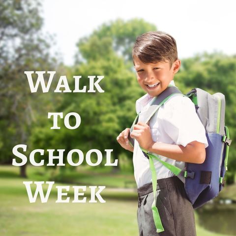 cheerful boy promoting walk to school week - Download Free Stock Templates Pikwizard.com