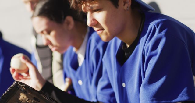 Focused Baseball Players in Blue Jerseys on Bench - Download Free Stock Images Pikwizard.com