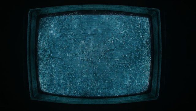 Blue Static Noise on Vintage CRT Television Screen
