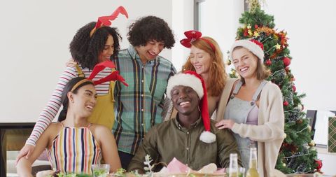 Joyful Holiday Gathering of Diverse Friends at Christmas