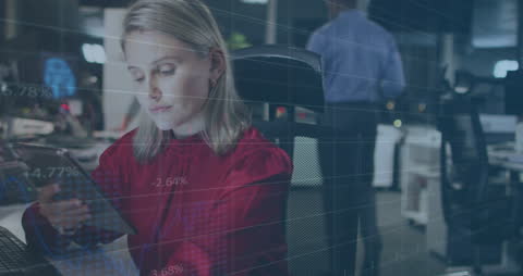 Businesswoman Utilizing Tablet Amidst Digital Data Interface