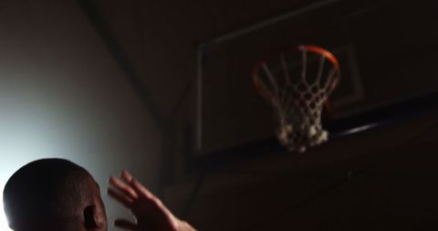 Silhouette of Basketball Player Aiming Shot in Indoor Court - Download Free Stock Images Pikwizard.com
