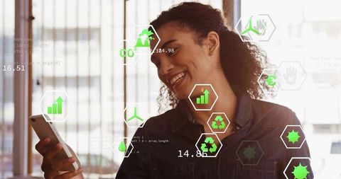 Smiling woman holding smartphone viewing ar sustainability analytics with green icons