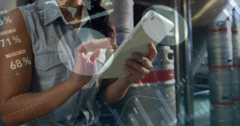 Commuter woman using tablet on train with futuristic data visualization overlays