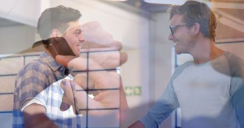 Caucasian Male Friends Chatting and Laughing in Bright Indoor Space
