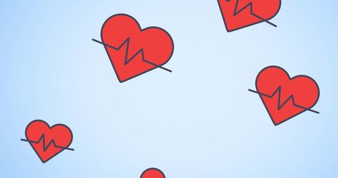 Red hearts with cardiogram lines on blue background