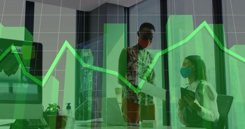 Business Professionals Analyzing Data Amid Covid-19 Precautions