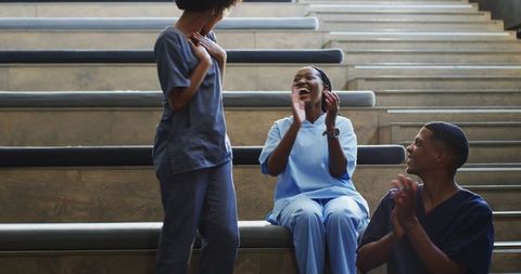 Medical Students Celebrating Success on Bench