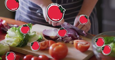 Healthy cooking: woman chopping vegetables with tomato overlay