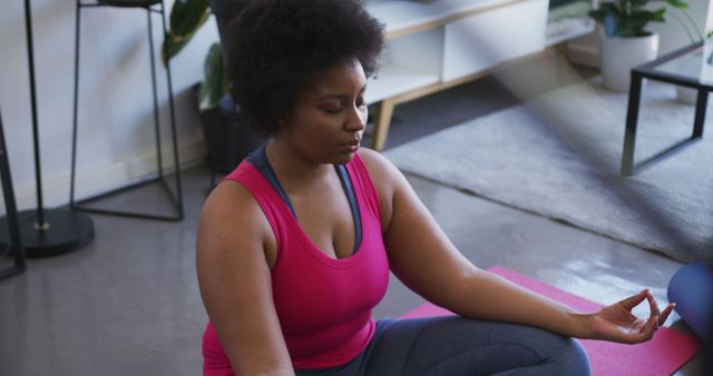 Plus Size African American Woman Meditating at Home - Download Free Stock Images Pikwizard.com