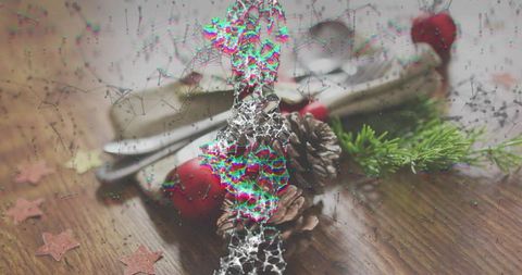 Rustic Holiday Table Centerpiece Pinecones Red Baubles Silver Cutlery with Glitch Overlay