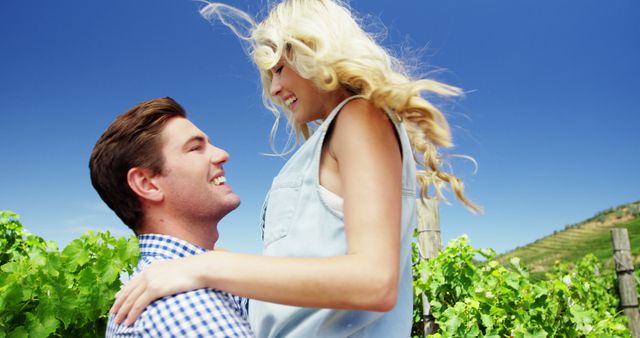 Romantic couple enjoying in vineyard on a sunny day - Download Free Stock Photos Pikwizard.com