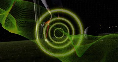 Soccer Player Practicing with Futuristic Green Light Trails