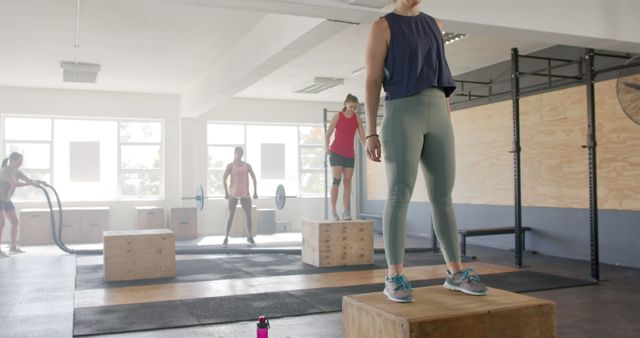 Group of People Performing High-Intensity Training Exercises at the Gym - Download Free Stock Images Pikwizard.com