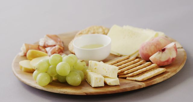 Assorted Cheese Platter with Fruits, Crackers, and Honey - Download Free Stock Images Pikwizard.com