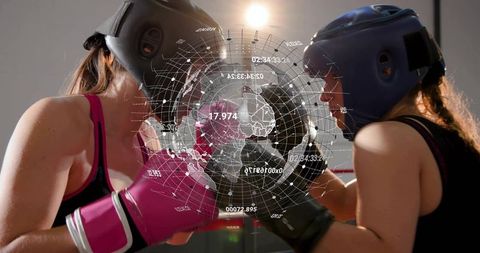 Two women boxers sparring in ring wearing headgear and gloves with futuristic hud overlay