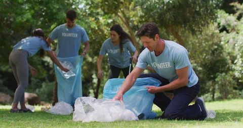 Diverse Volunteers Engaged in Eco-Friendly Park Cleanup - Download Free Stock Images Pikwizard.com
