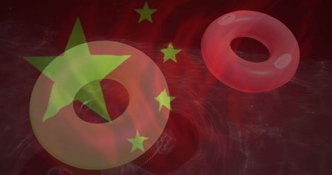 China Flag Overlaid on Pool Float Rings in Water