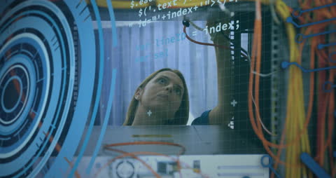 Technician Analyzing Data Center Through Futuristic Interface