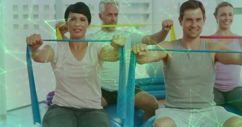 Adults Engaging in Group Resistance Band Workout with Holographic Globe