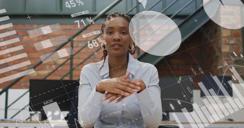 Businesswoman Analyzing Innovating Data Charts in Office Environment