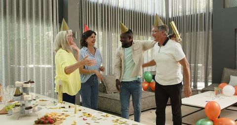 Diverse group celebrating at office party