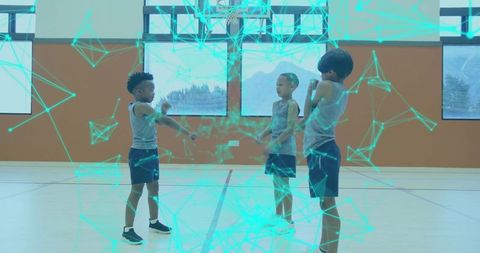 Energetic Boys Playing in Gym with Holographic Digital Effects