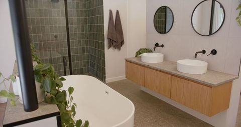 Modern Bathroom Design with Tub and Dual Vanity Sink