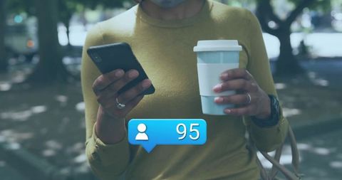 Woman Enjoying Coffee Outdoors with Smartphone and Social Media Alert