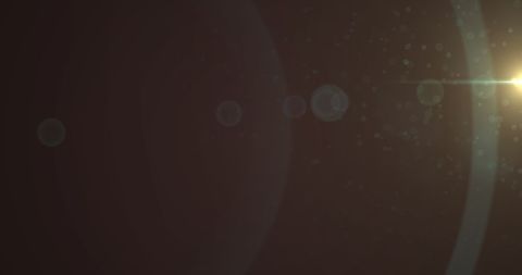 Abstract Glowing Light Spots and Curved Motion on Brown Background - Download Free Stock Images Pikwizard.com