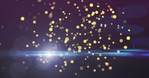 Vibrant bokeh lights over dark background