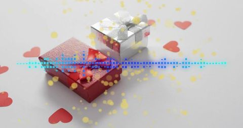 Red and silver gift boxes displaying heart confetti, ribbon and blue soundwave overlay