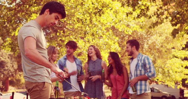 Friends Enjoying Outdoor Barbecue at Park - Download Free Stock Images Pikwizard.com