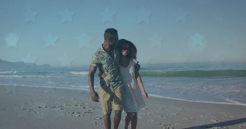 Romantic Couple Walking on Beach with Overlay Stars