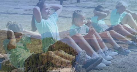 Children exercising outdoors with coach transitioned over forest