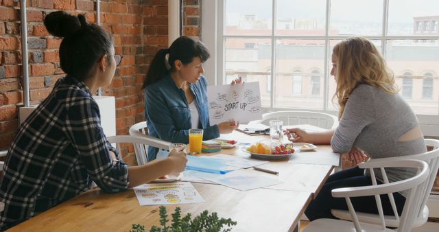 Diverse Women Collaborating on Startup Idea in Bright Office - Download Free Stock Images Pikwizard.com