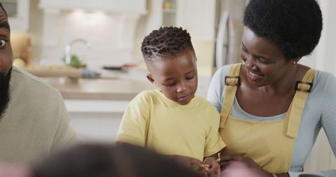 Happy Family Dining Together at Home in Morning