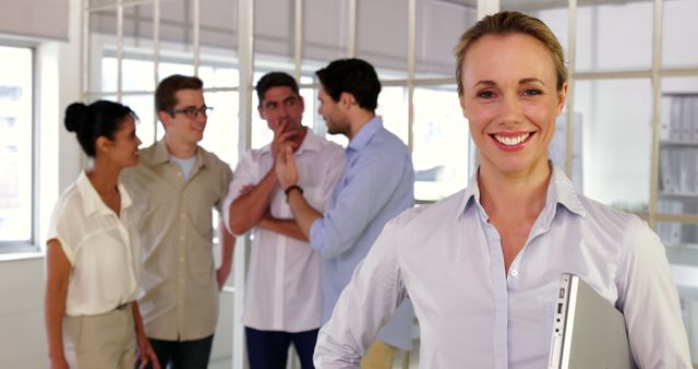 Confident Businesswoman Leading Meeting with Team in Office - Download Free Stock Images Pikwizard.com